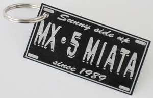 Key Ring with 'MX-5 Miata - Sunny side up since 1989' emblem